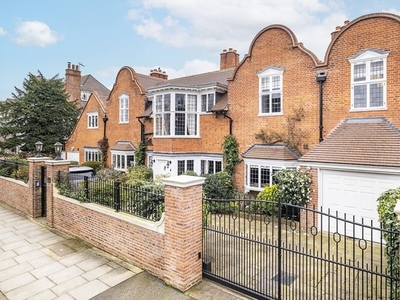 Detached house to rent in Marryat Road, London SW19