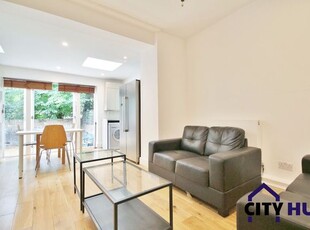 Terraced house to rent in Carol Street, London NW1