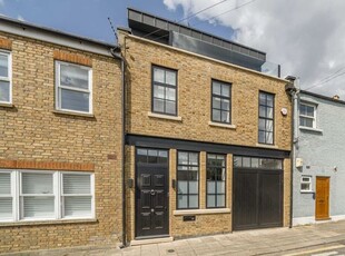 Terraced house to rent in Grove Mews, London W6