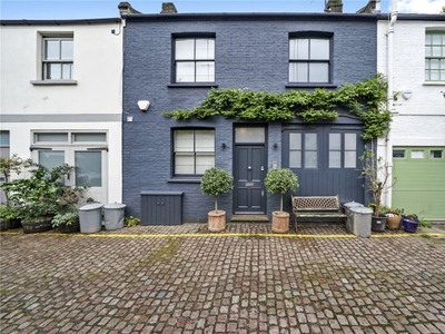Terraced house to rent in Pembridge Mews, London W11