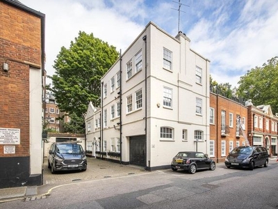 Detached house to rent in Woods Mews, London W1K