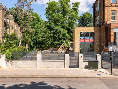 Link-detached house for sale in Fellows Road, London NW3.